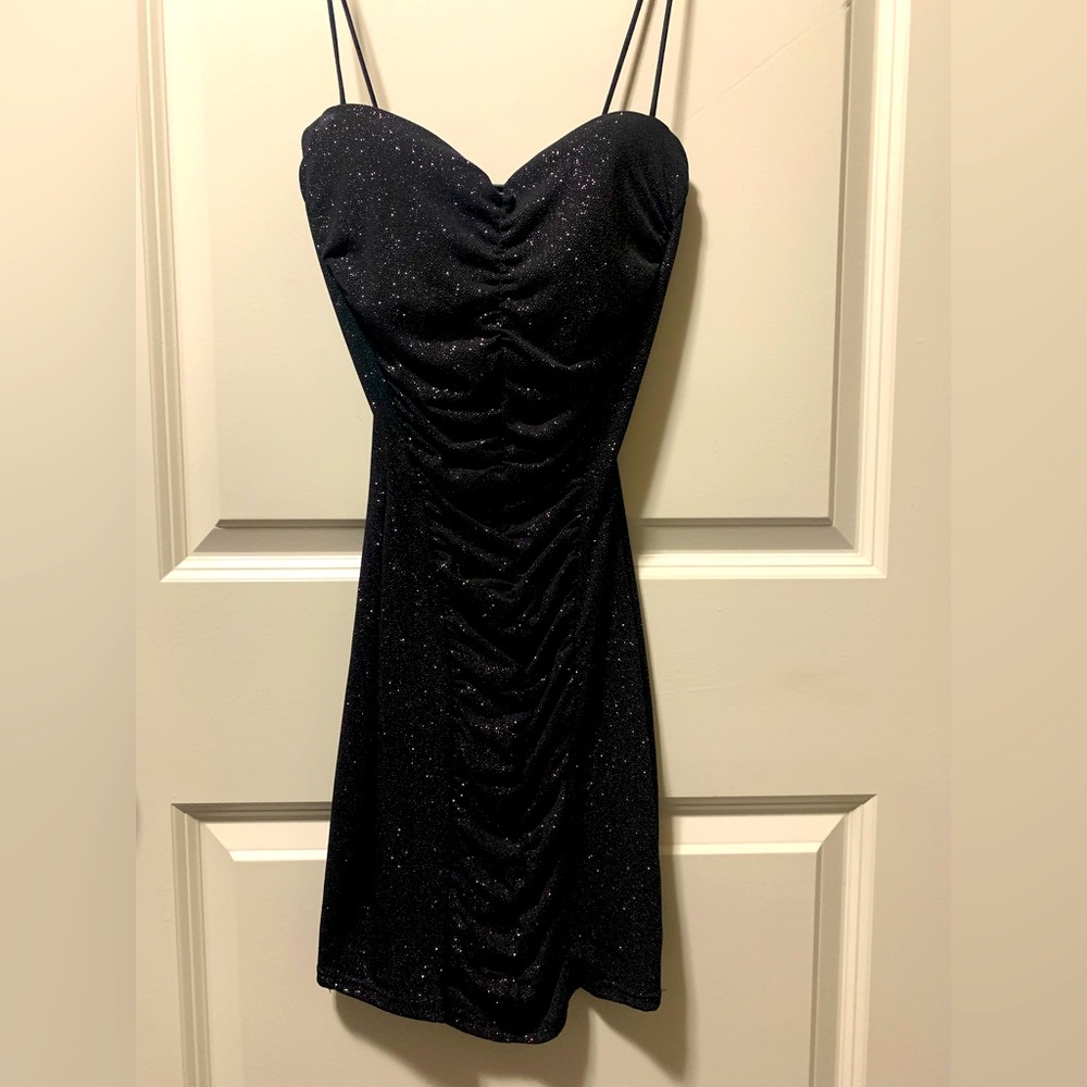 Dazzling at Christmas parties!! perfect little black sparkling party dress